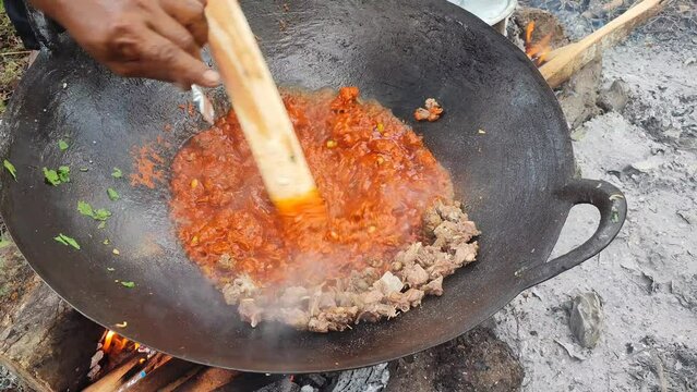 Aceh, Indonesia &ndash; March 14, 2023: Making fried rice perfunctory at tourist attractions in Aceh province, Aceh Province, Indonesia on March 14, 2023