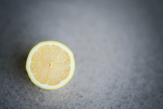 Close-up of lemon slice on table