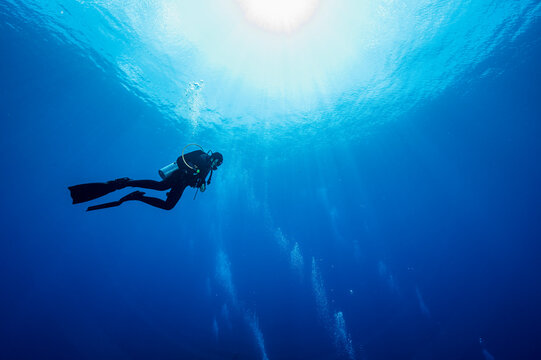 diver floating in the Banda Sea during mandatory safety stop