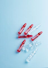 Ampoules with medical preparations or vaccine for injection on the table