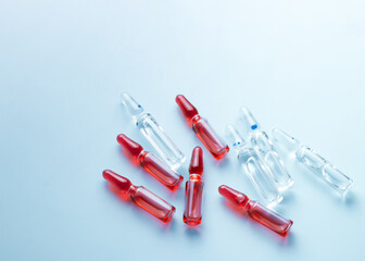 Ampoules with medical preparations or vaccine for injection on the table