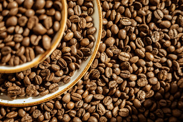 Сoffee beans poured into a coffee pair