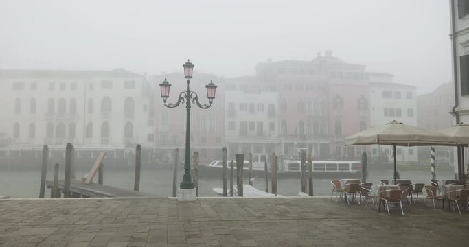 Vaporetto on Canal Grande in Venice on a foggy winter day 