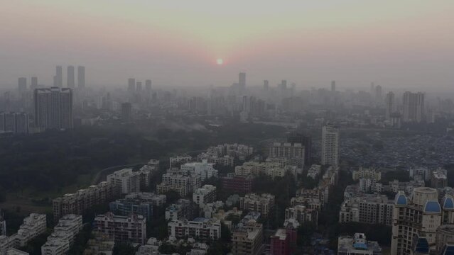 Aerial Panorama Of Mumbai Suburban Skyline At Rush Hour. - Aerial Panning Left 
