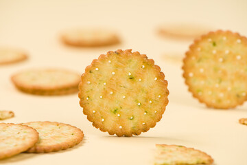 closeup of tasty crackers or biscuit on yellow background.