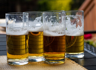 Glasses of cold tasty ligth beer