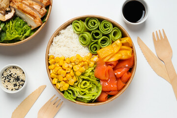 Bowls with tasty and nutritious food, top view