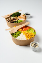 Bowls with tasty and nutritious food, delicious homemade lunch