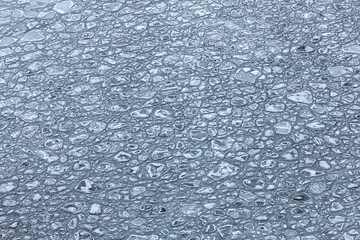 broken ice on sea water as texture