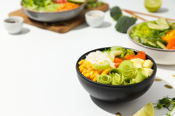 Bowls with tasty and nutritious food, space for text