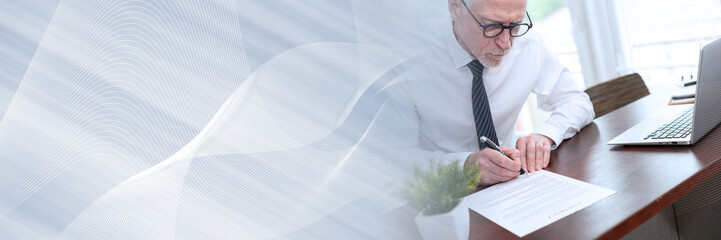Senior businessman signing a document (lorem ipsum text used); panoramic banner