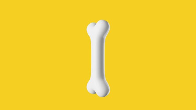 Rotating white bone on a yellow background looped 3d render animation
