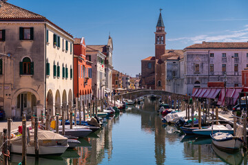 Fototapeta na wymiar View of Chioggia with its canals and boats. Veneto, Italy.
