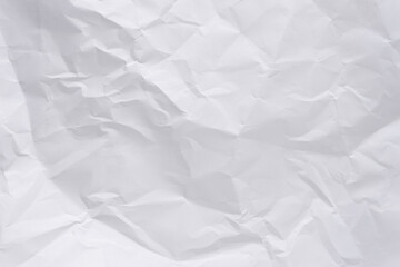 White crumpled paper texture background, clean white wrinkled paper, top view.