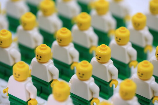  Hong Kong -March 15 2023:  minifigure act like crowd of people stand together with bald head show the strong feeling of teamwork