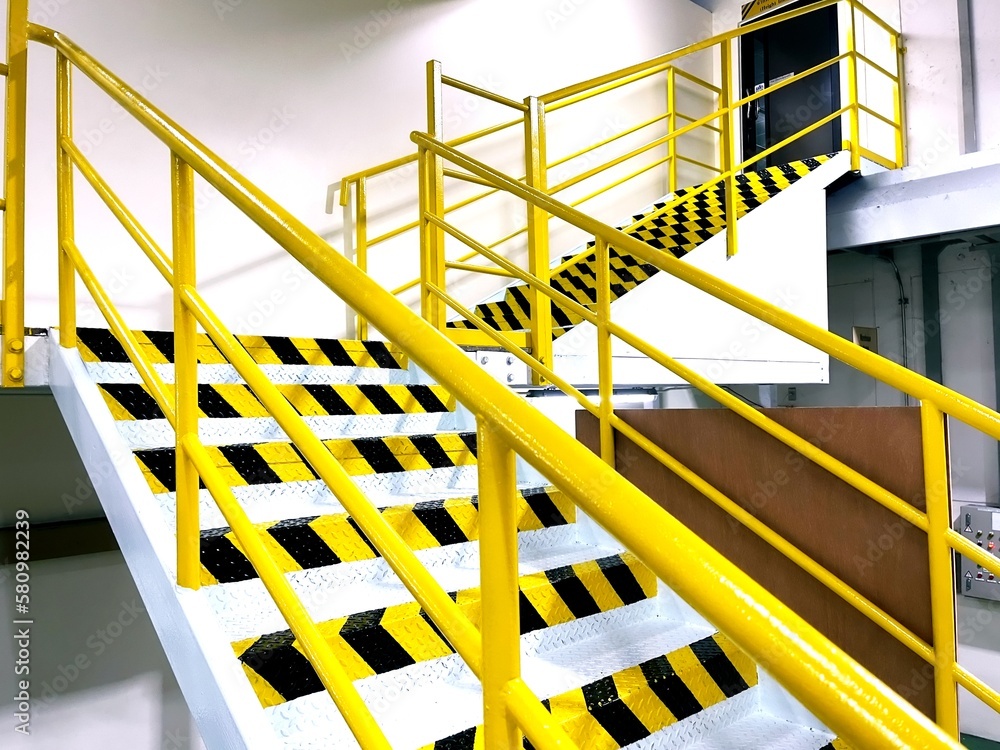 Poster emergency exit stairs inside the factory