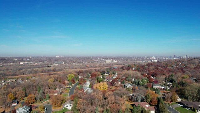 Drone aerial views of Mendota Heights in West St. Paul, MN during fall