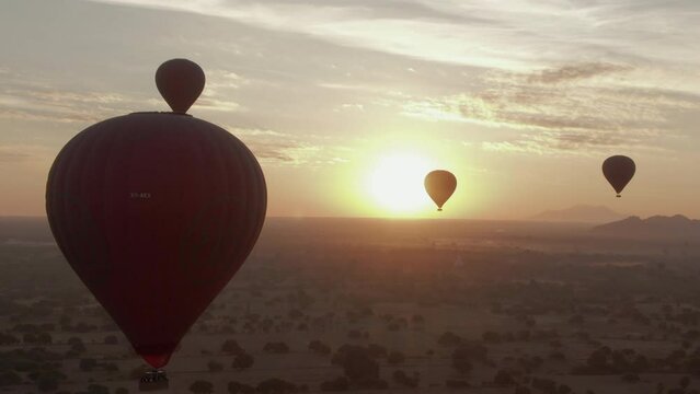 Close up of Hot Air Balloon  During a Beautiful Cinematic Sunrise over Bagan, Myanmar
