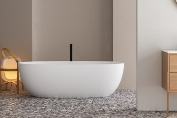 Obraz na płótnie Canvas Stylish white bathtub on terrazzo floor with back faucet in bright bathroom, beige and white wall background. 3d Rendering
