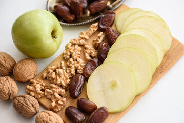 Something of various healthy superfoods on white marble kitchen table background