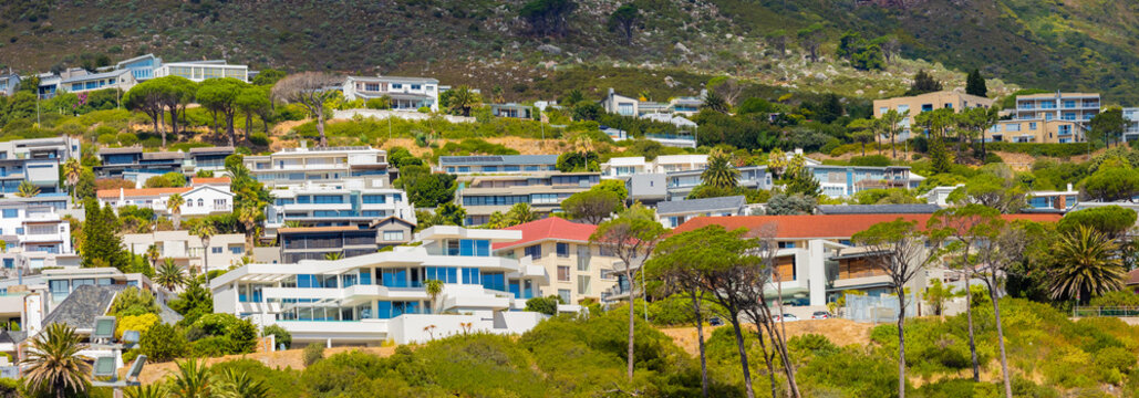 Large mansions in Camps Bay below Table Mountain