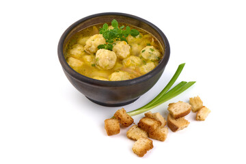 Dietary soup with chicken meatballs, isolated on white background.