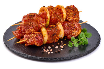 Raw pork skewers, ready to cook, kebab BBQ, isolated on white background.