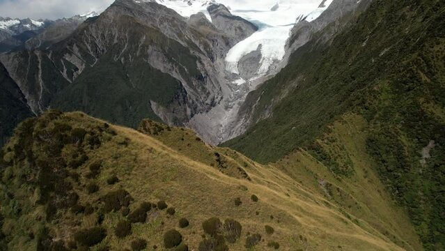 Franz Josef Glacier, famous tourist attraction on West Coast, New Zealand - aerial drone