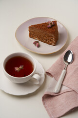 Chocolate honey cake on a white background