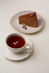 Chocolate honey cake on a white background