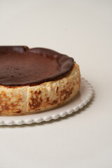 Cheesecake with fresh fruits on white background