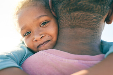 Face portrait, child or black family hug, embrace or bond on outdoor vacation for peace, freedom and quality time. Sunshine flare, love or African youth kid, father or people together in South Africa