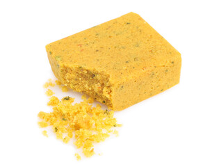 Bouillon cube on white background, close-up