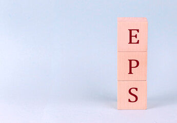 EPS on wooden cubes on a blue background