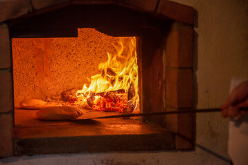 preparation of Sardinian Pane Carasau, Carasau bread, traditional crispy bread of Sardinia, Italy
