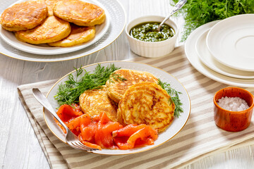 pancakes with sliced cold smoked salmon, top view