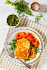 pancakes with sliced cold smoked salmon, top view