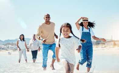 Fototapeta na wymiar Family, beach and parents running with girl in water for bonding, quality time and adventure together. Travel, happy and mom, dad and grandparents with child enjoy summer holiday, vacation and relax