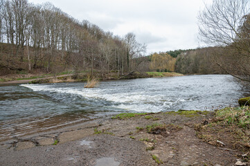 Etal Ford through the River Till after heavy rain, Northumberland, England