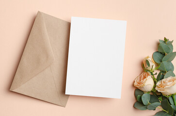 Wedding invitation card mockup with fresh roses flowers, blank card