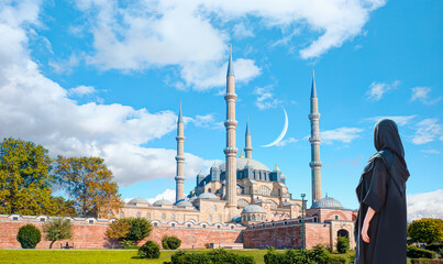 Selimiye Mosque. The UNESCO World Heritage Site Of The Selimiye Mosque, Built By Mimar Sinan In 1575  - Beautiful girl wearing traditional dress