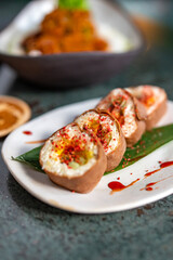 set of sushi roll in plate