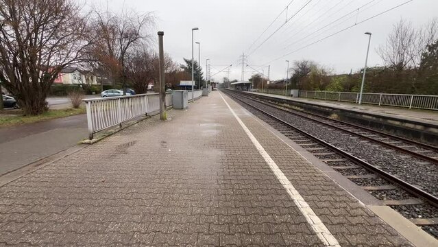 Staircase to a small train station or bus stop without people