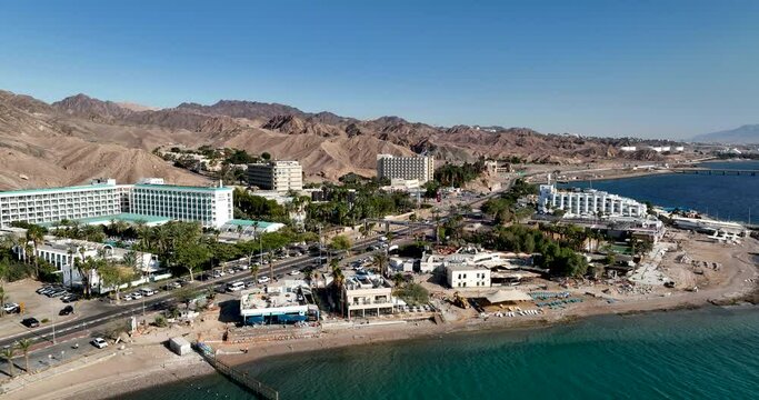 Aerial footage of hotels and beaches near Eilat Coral Beach Nature Reserve. Filmed in C4K Apple ProRes 422 HQ