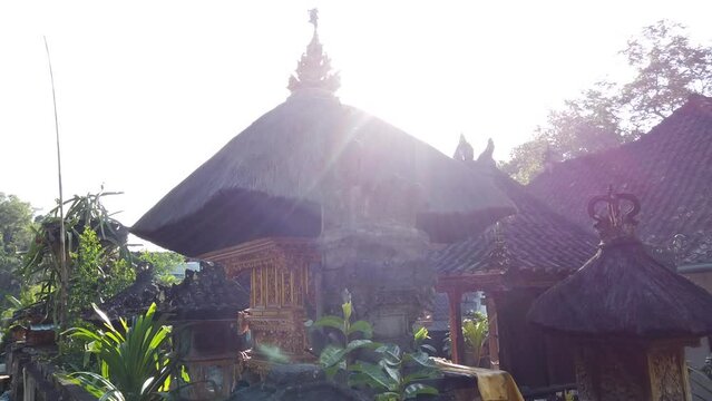 Balinese Architecture Traditional Bali Temple Roof, Sidemen Karangasem Daylight Village Atmosphere with Green Trees and Local Street