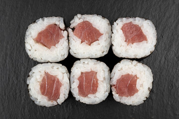 Above ground Japanese sushi food. Maki and rolls with tuna, salmon, shrimp, crab and avocado. Top view of various sushi, all you can eat menu. Rainbow sushi roll, uramaki, hosomaki and nigiri.