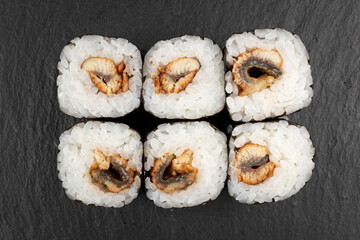 Above ground Japanese sushi food. Maki and rolls with tuna, salmon, shrimp, crab and avocado. Top view of various sushi, all you can eat menu. Rainbow sushi roll, uramaki, hosomaki and nigiri.