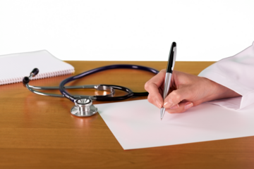 Doctor Writing on a Piece of Paper