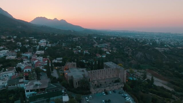 Bellapais Monastery aerial sunset view in Bellapais village, North Cyprus