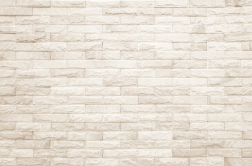 Empty background of wide cream brick wall texture. Beige old brown brick wall concrete or stone textured, wallpaper limestone abstract.	